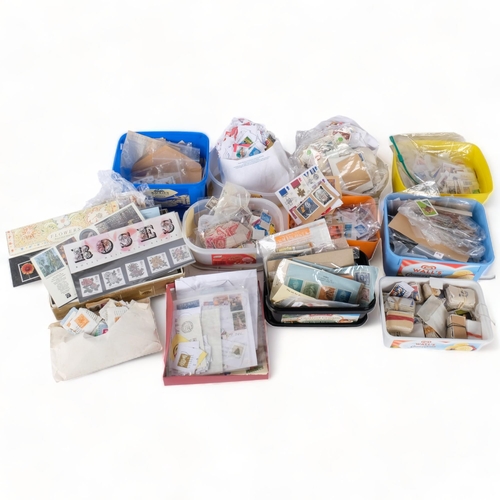 96 - A large quantity of used loose UK and worldwide stamps, sheaths of stamps, etc (boxful)