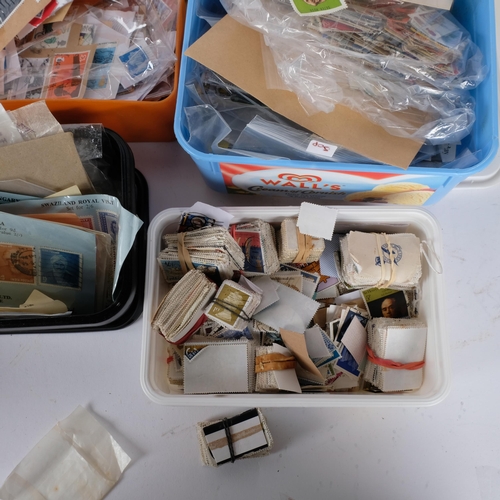 96 - A large quantity of used loose UK and worldwide stamps, sheaths of stamps, etc (boxful)