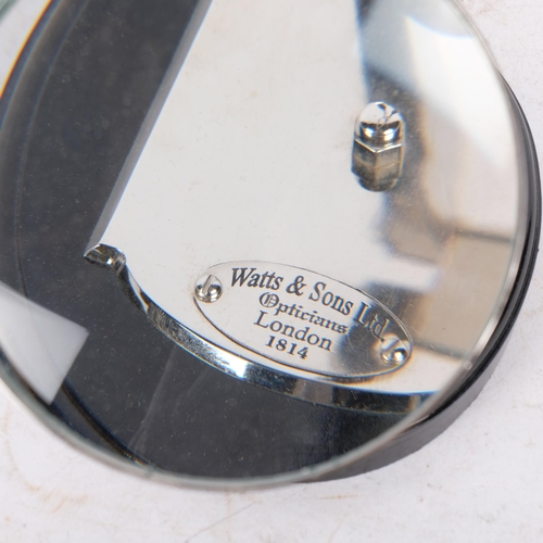 501 - A reproduction silver plated adjustable desk magnifying glass, on plinth, 12.5cm diameter