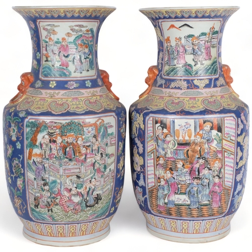 518 - A pair of Oriental blue ground vases, with figure decorated enamelled panels, H46cm