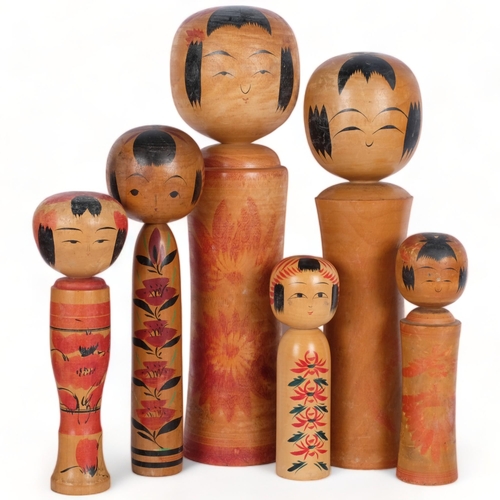 522 - A group of 6 painted wood Japanese Kokeshi dolls, tallest 40cm