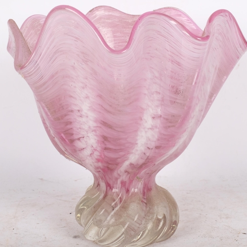 529 - A pink Art glass vase with wavy rim, on clear base, probably Murano, 22cm