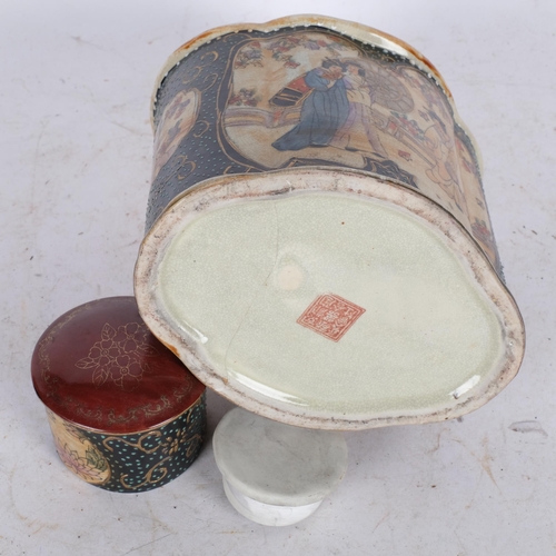 532 - A Chinese ceramic caddy, with stopper and cover, with painted and gilded panels, base cracked, H20cm