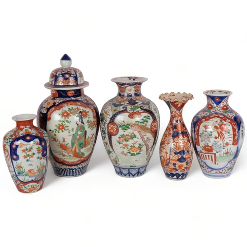 537 - An Imari jar and cover with painted panels, H37cm, a Chinese porcelain vase with panels decorated wi... 