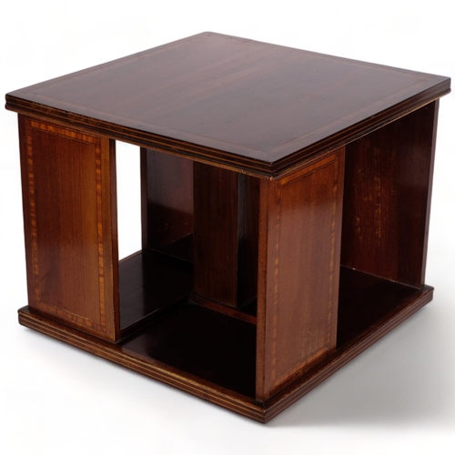 542 - An inlaid mahogany revolving bookcase, 35.5cm across