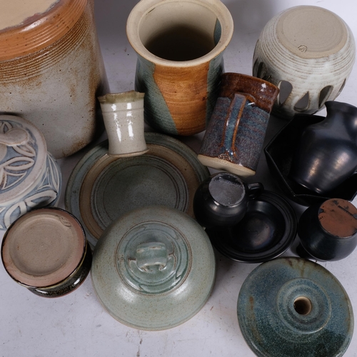 545 - A group of Studio pottery jars and covers, butter dish etc, tallest 23.5cm