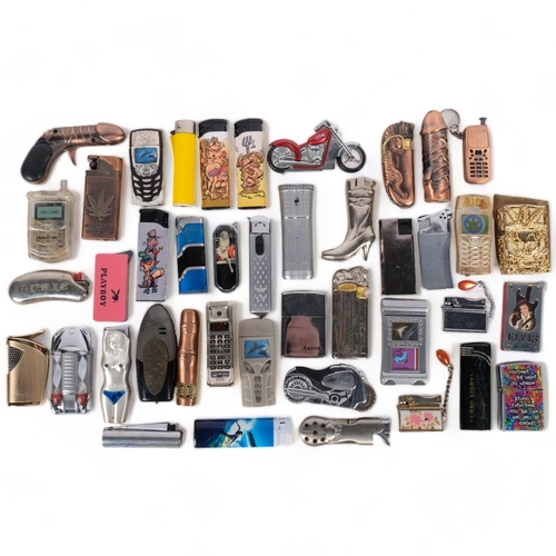 553 - A collection of novelty pocket cigarette lighters, etc