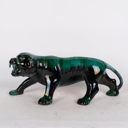 559 - A large Canadian Blue Mountain pottery study of a tiger, L57cm