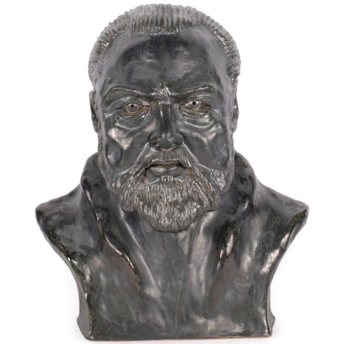 561 - A grey glazed clay bust of Orson Welles, H33cm