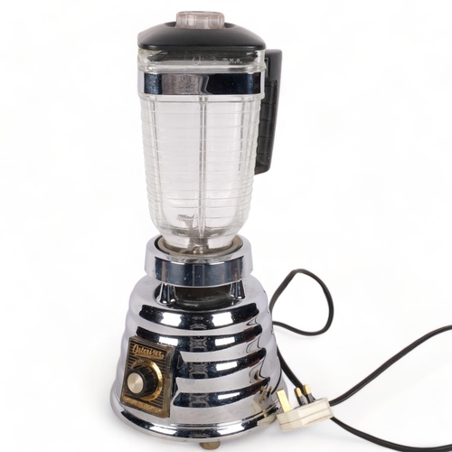 565 - A Vintage Osterizer custom blender, on chromed base, H40cm