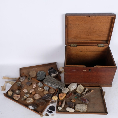 567 - An oak box with tray fitted interior, containing a selection of minerals and stones, 35.5cm across