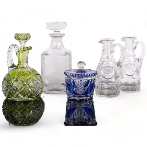 588 - A green Bohemian cut-glass decanter, with associated stopper, H21cm, a Bohemian blue cut-glass jar w... 