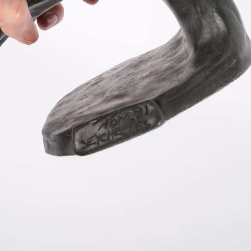 591 - After TOM BOWER - a late 20th century cast resin model of a hand, the base with cast signature 