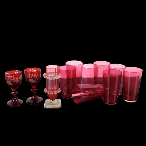 594 - A quantity of Vintage cranberry glass, including 8 beakers, H9cm, 2 similar etched glass Sherry glas... 