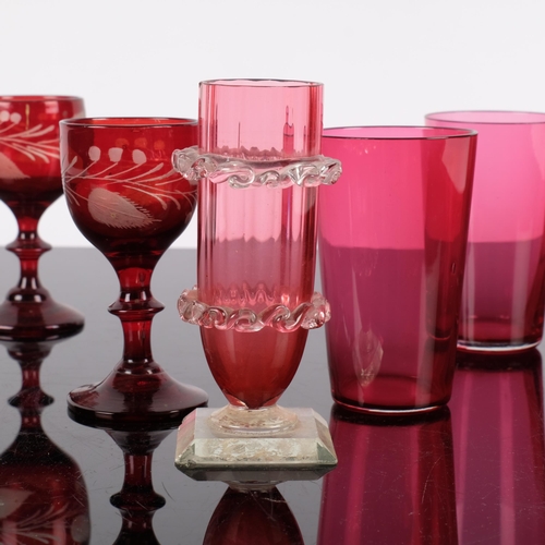 594 - A quantity of Vintage cranberry glass, including 8 beakers, H9cm, 2 similar etched glass Sherry glas... 