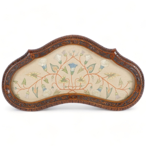 595 - A Victorian serving tray, the mahogany framed needlepoint, floral design, 29cm x 57cm