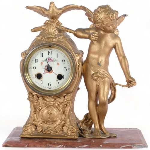 605 - A French gilt-metal mantel clock, 8-day movement with enamel dial, cherub and bird decoration, on ma... 