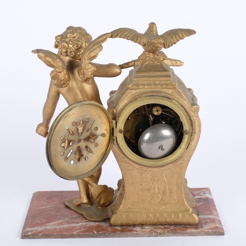 605 - A French gilt-metal mantel clock, 8-day movement with enamel dial, cherub and bird decoration, on ma... 