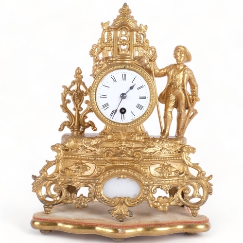 606 - A French gilt-metal mantel clock, on velvet plinth, H35cm