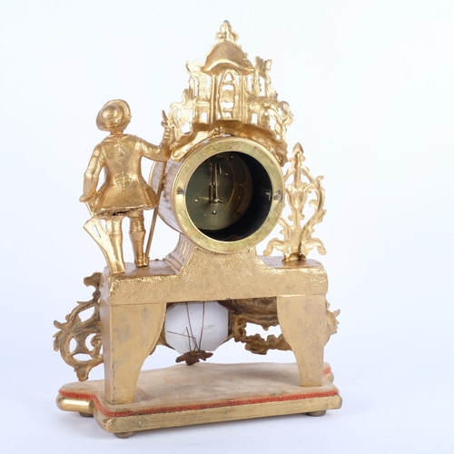 606 - A French gilt-metal mantel clock, on velvet plinth, H35cm