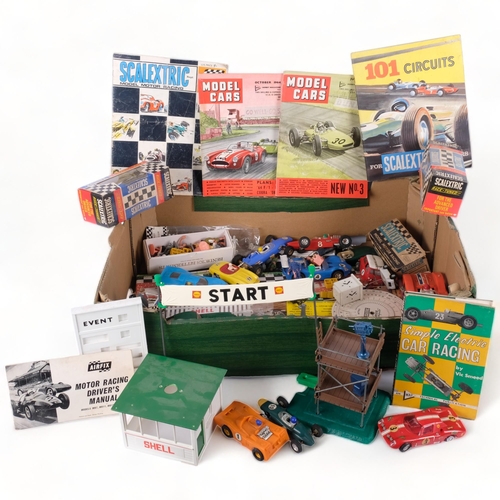 624 - A large quantity of Scalextric and slot car Vintage toys, including many vehicles, accessories and e... 