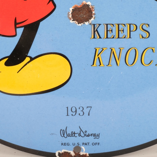 630 - A reproduction circular enamel sign, Sunoco Motor Oil, with Mickey Mouse caricature, diameter 30cm