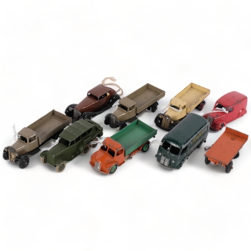 634 - A group of loose Dinky toys, to include a Dodge tipping wagon, several flat bottom trucks and tippin... 