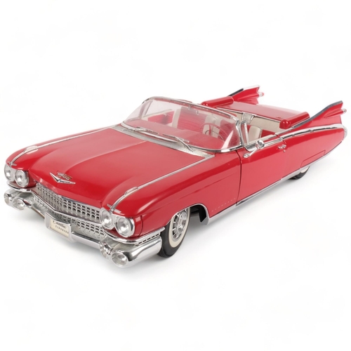 636 - A Maisto 1/12 scale diecast model of a 1959 Cadillac Eldorado Biarritz, in original box and packagin... 