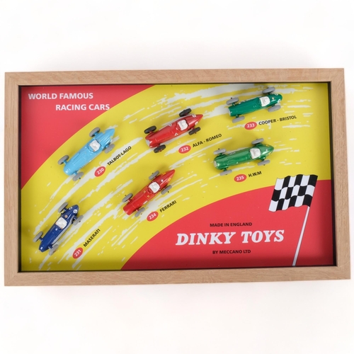 637 - A Dinky Toys World Famous Racing Cars counter shop display, mounted in a wooden frame for wall hangi... 