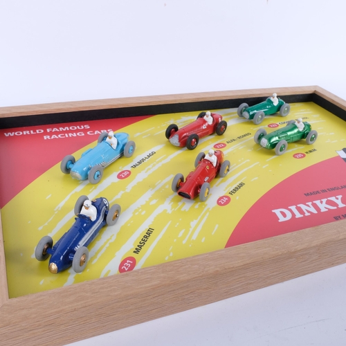 637 - A Dinky Toys World Famous Racing Cars counter shop display, mounted in a wooden frame for wall hangi... 