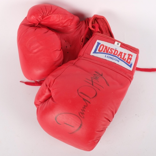 645 - BOXING INTEREST - a pair of boxing gloves, signed by former World Heavyweight Champion David Haye, i... 