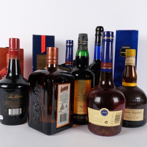 674 - Various liqueurs, including Cointreau and Courvoisier, and a Bristol Cream Sherry