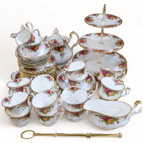 689 - Royal Albert Old Country Roses teaware, matching dinner plates and sauce boat, and cake stand