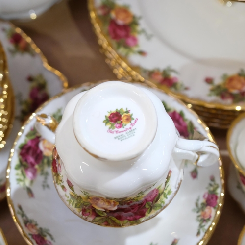 689 - Royal Albert Old Country Roses teaware, matching dinner plates and sauce boat, and cake stand