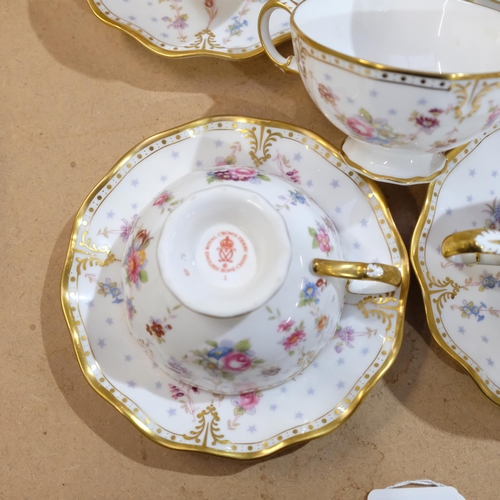 690 - Royal Crown Derby part tea set, in Royal Antoinette pattern, 1 cup repaired