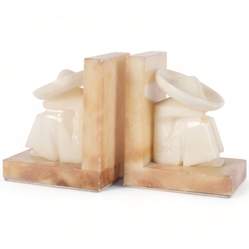 692 - A pair of Art Deco alabaster figure bookends, H14.5cm