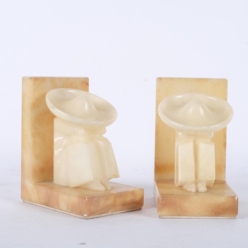 692 - A pair of Art Deco alabaster figure bookends, H14.5cm