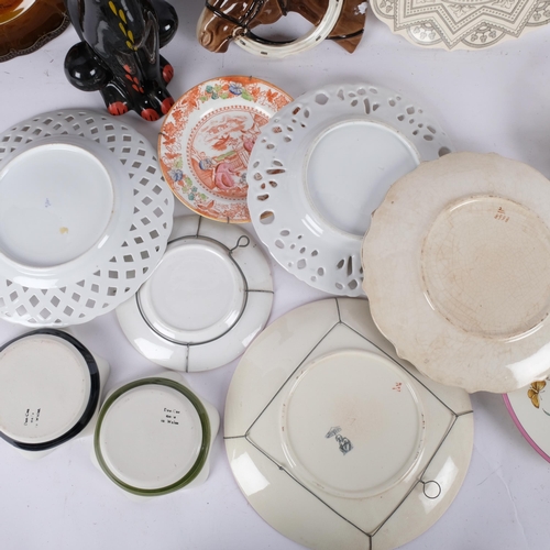 697 - A quantity of Antique and later ceramic ware, including a reticulated edge porcelain cake plate, sta... 