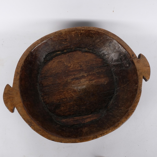 698 - A large hand carved polished wood dough or fruit bowl, 45cm diameter