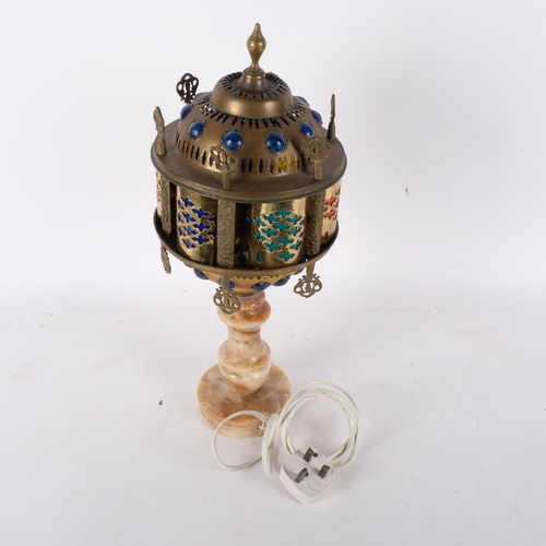 722 - A lovely Moroccan table lamp, with an onyx base, and decorative copper carousel shade, with multiple... 