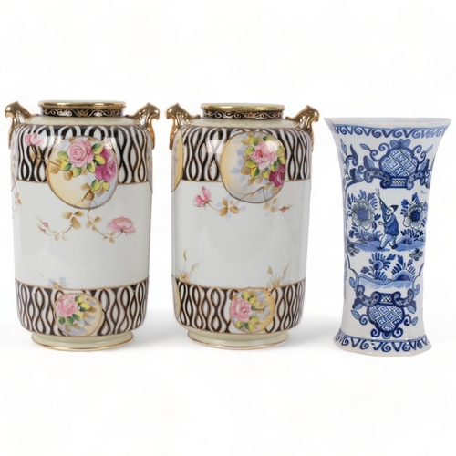 725 - A pair of hand painted Japanese vases, lovely gilded decoration with various hand painted rose bush ... 