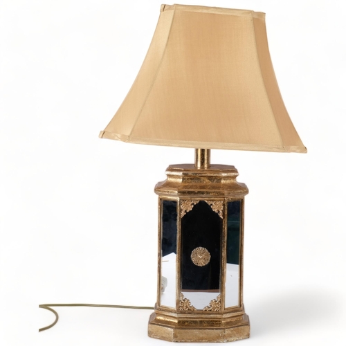 727 - A Vintage style champagne gold large mirrored table lamp, with associated shade, height including sh... 