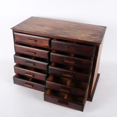 730 - A large modern stained wood table-top chest of 10 short drawers, each drawer split into compartments... 