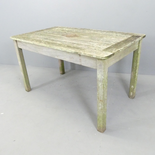 2659 - LISTER - A weathered teak slatted garden table. 120x68x71cm. With maker's label.