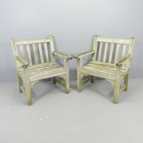 2662 - LISTER - A pair of weathered teak garden chairs. Overall 74x87x63cm. One with maker's lable.