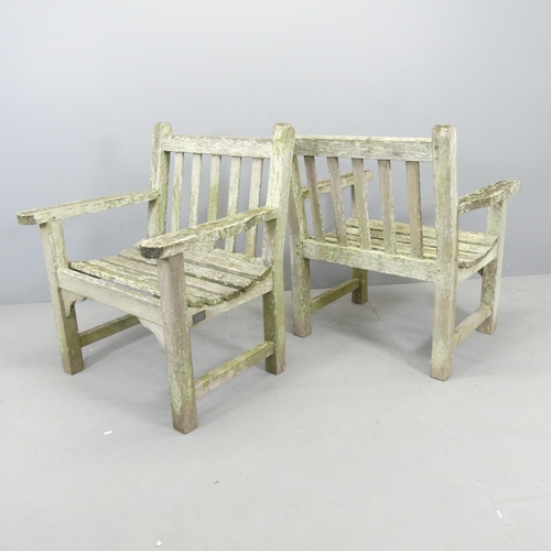 2662 - LISTER - A pair of weathered teak garden chairs. Overall 74x87x63cm. One with maker's lable.