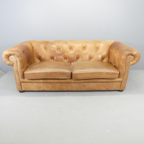 2664 - A modern button-back leather upholstered Chesterfield style sofa. Overall 200x72x104cm, seat 150x42x... 