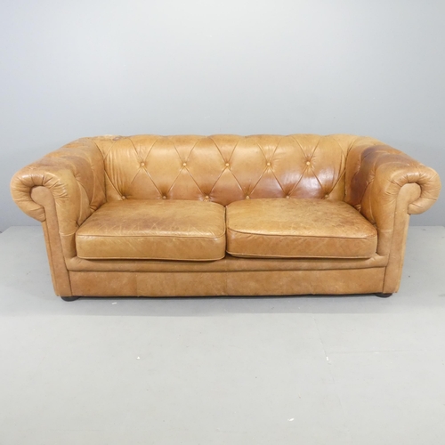 2665 - A modern button-back leather upholstered Chesterfield style sofa. Overall 200x72x104cm, seat 150x42x... 