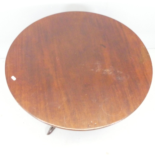 2676 - An antique mahogany circular tilt-top occasional table, with birdcage movement, central column and t... 