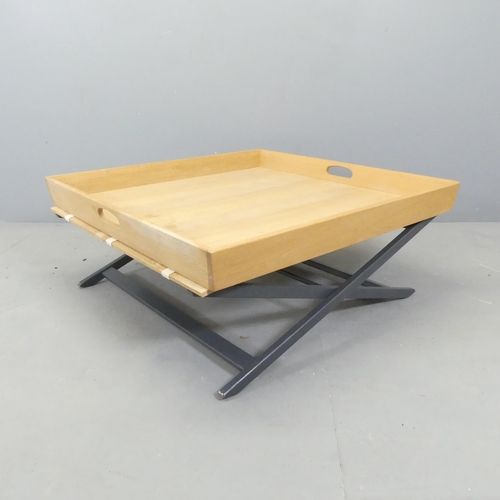 2680 - A modern pine square tray-top low  coffee table on folding base. 90x38cm.